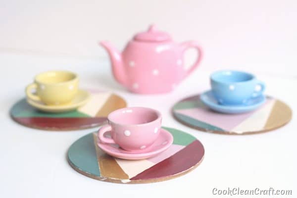 How to make hand-painted geometric coasters. A quick DIY decorating project.