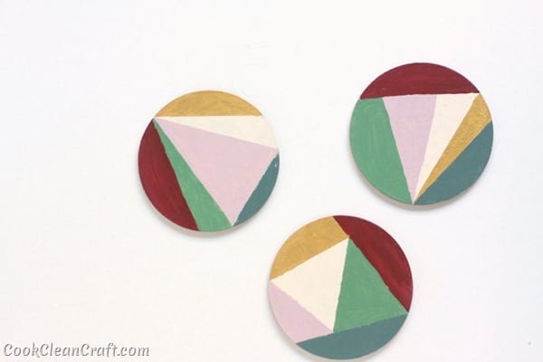 How to make hand-painted geometric coasters. A quick DIY decorating project.